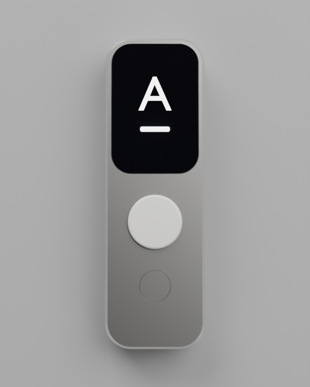 Front view of the slab: dark cover glass in the top half showing a white A, a proud ceramic push-to-talk button below it, and a hairline circular groove marking the flush secondary button